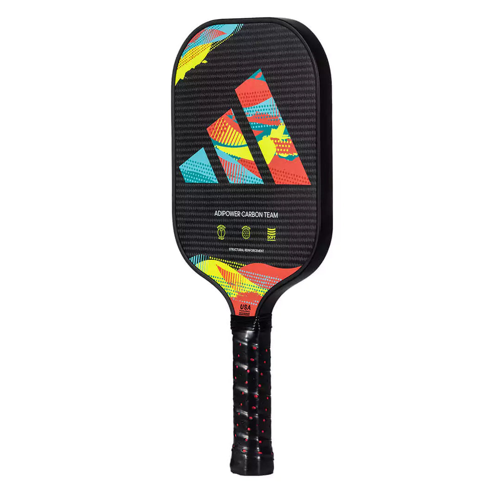 SPORT: PICKLEBALL. Shop Pickleball Paddles and Rackets at "iam-Pickleball.com" a division of "iamracketsports.com". Racket model is a 2023 Adidas ADIPOWER CARBON TEAM ATTK Pickleball Paddle/racket for professionals and advanced players. Racquet/Paleta is in side vertical orientation.