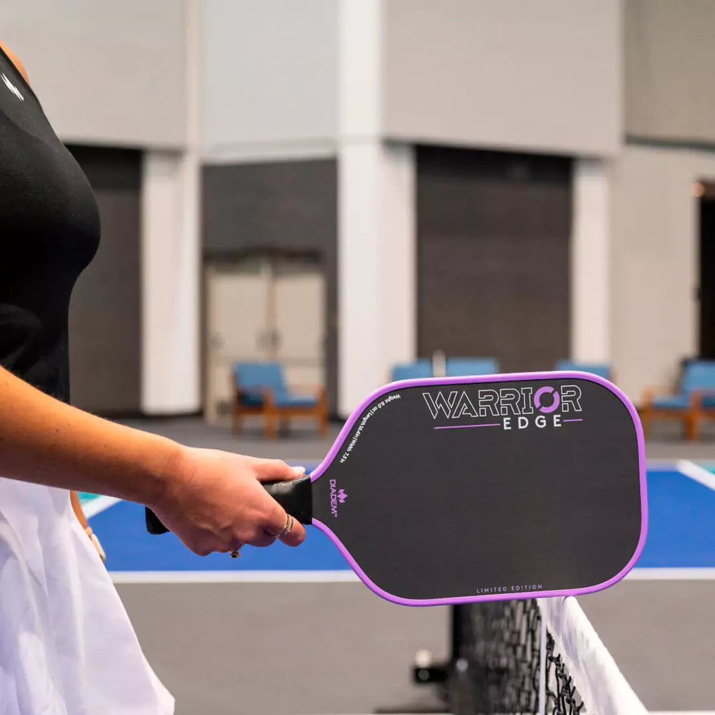 iamRacketSports presents Diadem Sports Warriors Edge Special Edition pickleball paddle in Lilac. Player holding paddle.