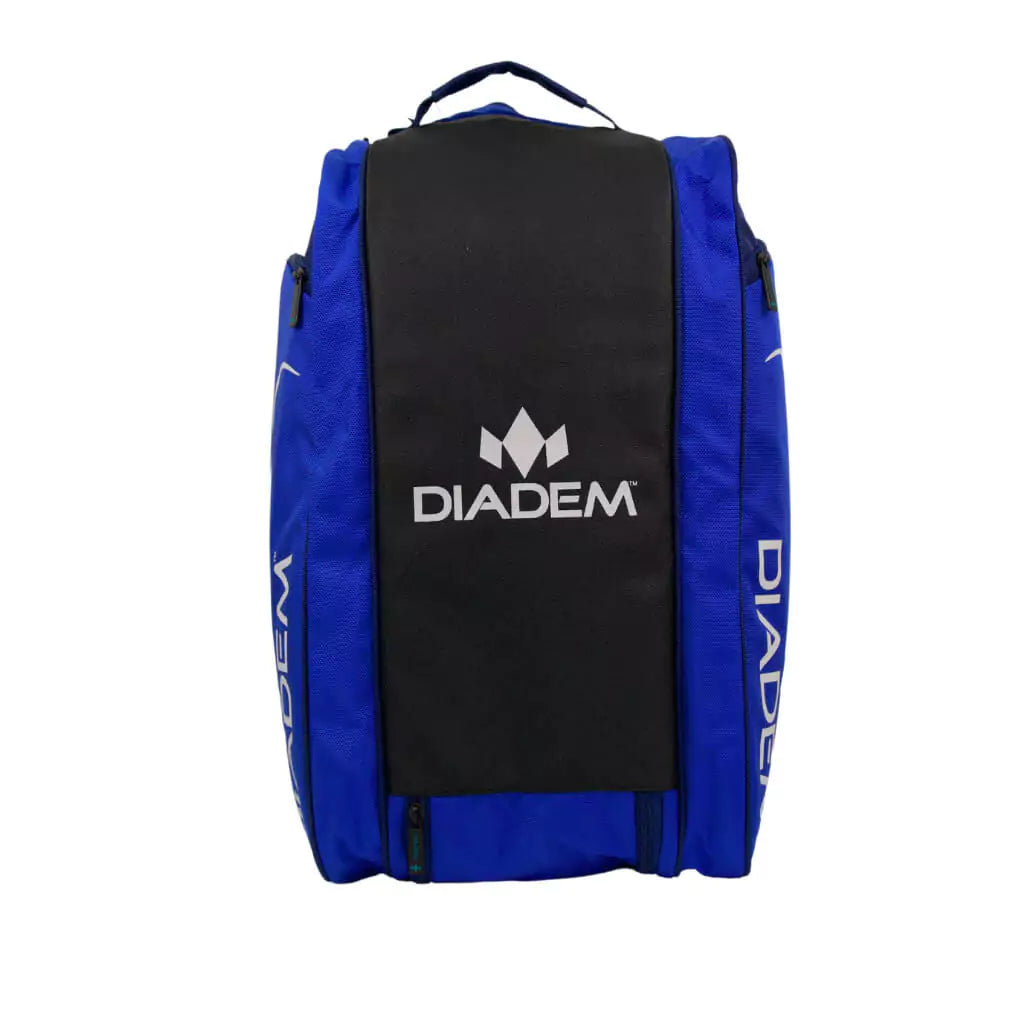 Shop Pickleball Bags at iamRacketSports.com Colisium Store. Top Profile of the Diadem Tour ELEVATE V3 Pickleball Paddle Bag with 3 paddle compartments, shoe compartment, side pockets, made from high quality nylon with adjustable handles, dimensions 21"x11"*12" in navy/blue and white.