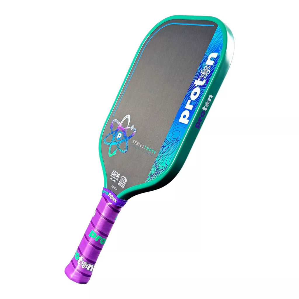 A Proton Series Three - Project Peacock Elongated 13mm Pickleball Paddle, 
available from Iam-pickleball.com, online and in-store, Miami USA, worldwide shipping.