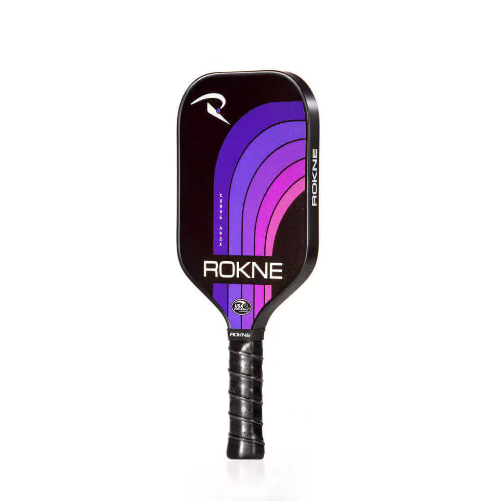 SPORT: PICKLEBALL. Shop Pickleball Paddles and Rackets at "iam-Pickleball.com" a division of "iamracketsports.com". Racket model is a 2023 Rokne Curve Apex NORTHERN SKY  Pickleball Paddle/racket for beginner and intermediate players. Racquet/Paleta is in side vertical orientation.