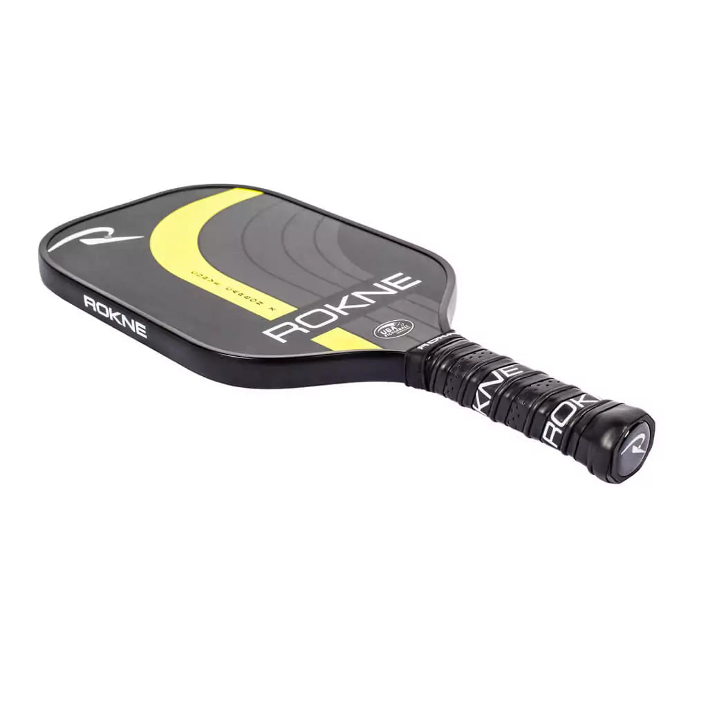 SPORT: PICKLEBALL. Shop Rokne Pickleball at iamRacketSports, Miami, Florida, USA. Racket model is a 2023 Rokne  Curve Carbon x LIGHTNING Pickleball Paddle/racket for advanced and professional players. Racquet/Paleta face.