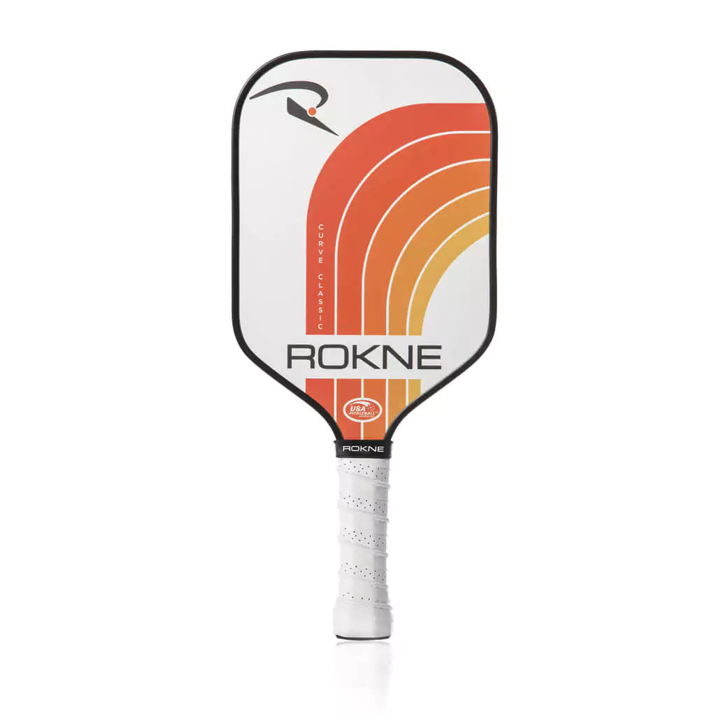 SPORT: PICKLEBALL. Shop Rokne Pickleball at USA premier Racket and Paddle Sports store, "iamracketsports". Racket model is a 2023 Rokne Curve Classic TANGERINE Pickleball Paddle/racket for beginner and intermediate players. Racquet/Paleta is in vertical orientation.