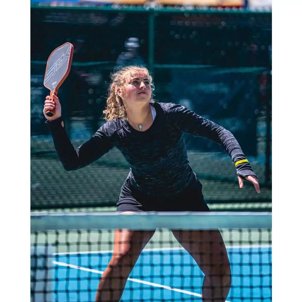 SPORT: PICKLEBALL. Shop Selkirk Sports Pickleball at USA premier Racket and Paddle Sports store, "iamracketsports". Racket model is a 2023 Selkirk SLK HALO CONTROL XL Pickleball Paddle/racket for professionals and advanced players. Female player using paddle.
