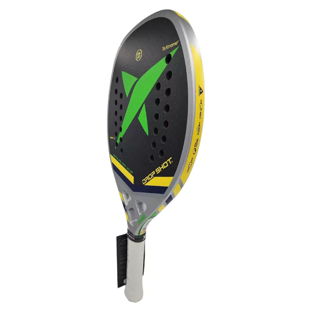 SPORT:BEACH TENNIS. Shop Dropshiot at "iamracketsports.com" Miami's Beach Tennis center. Drop Shot CENTAURO PRO 4 BT 2023 Beach Tennis Paddle, advanced , professional racket, carbon frame , 24K carbon textured face, 22 mm thick, 24 holes, length 50cm. Vertical rotated left displaying edge and racket face.