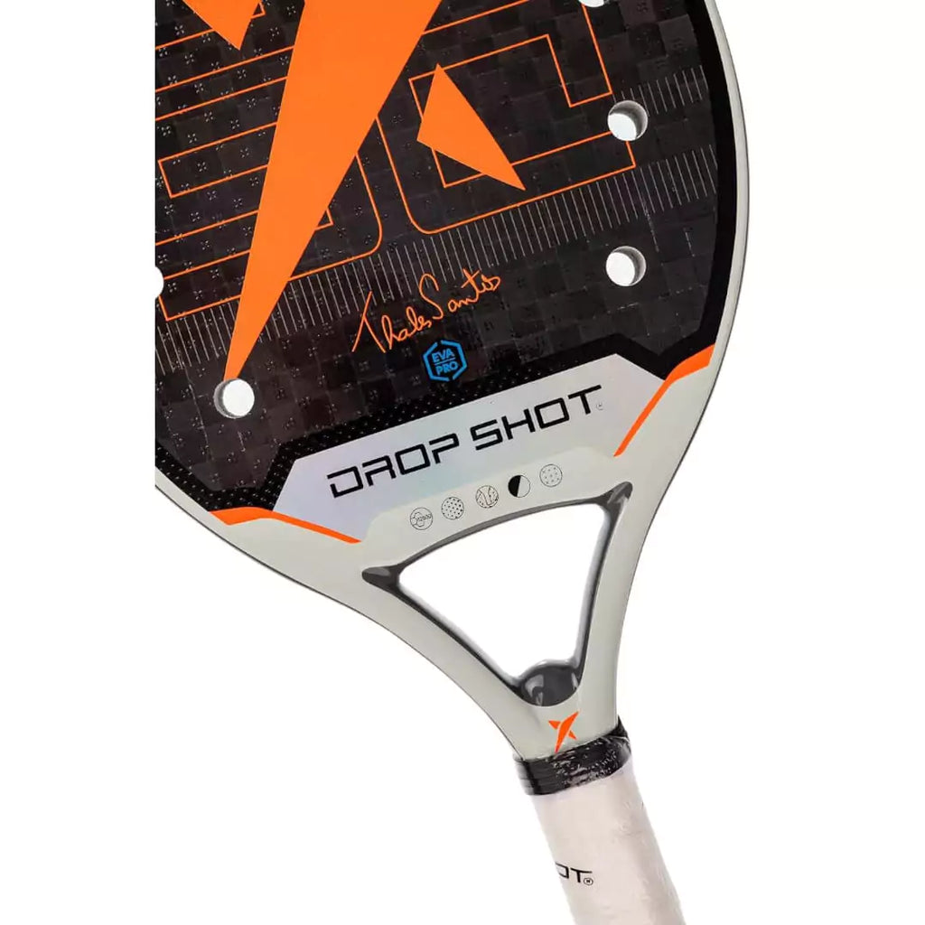 A  Drop Shot PREMIUM 4.0 BT 2024 professional Beach Tennis Paddle, iamBeachTennis.com stocked product, with EVA Soft Low Density core, carbon Textrem 12K face, 22mm thick, 320-340 grams and Spin coating. A partial racket face view.