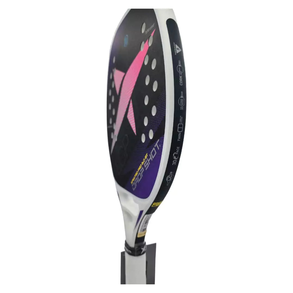 iamRacketSports Boutique Store Racket model Drop Shot SPEKTO PRO 6 BT 2023 Beach Tennis Paddle, Vertical rotated left displaying racket edge and face. An advanced , professional racket, carbon frame , 24K carbon textured 3d face, EVA Pro core,22 mm thick, 24 holes, length 50cm.