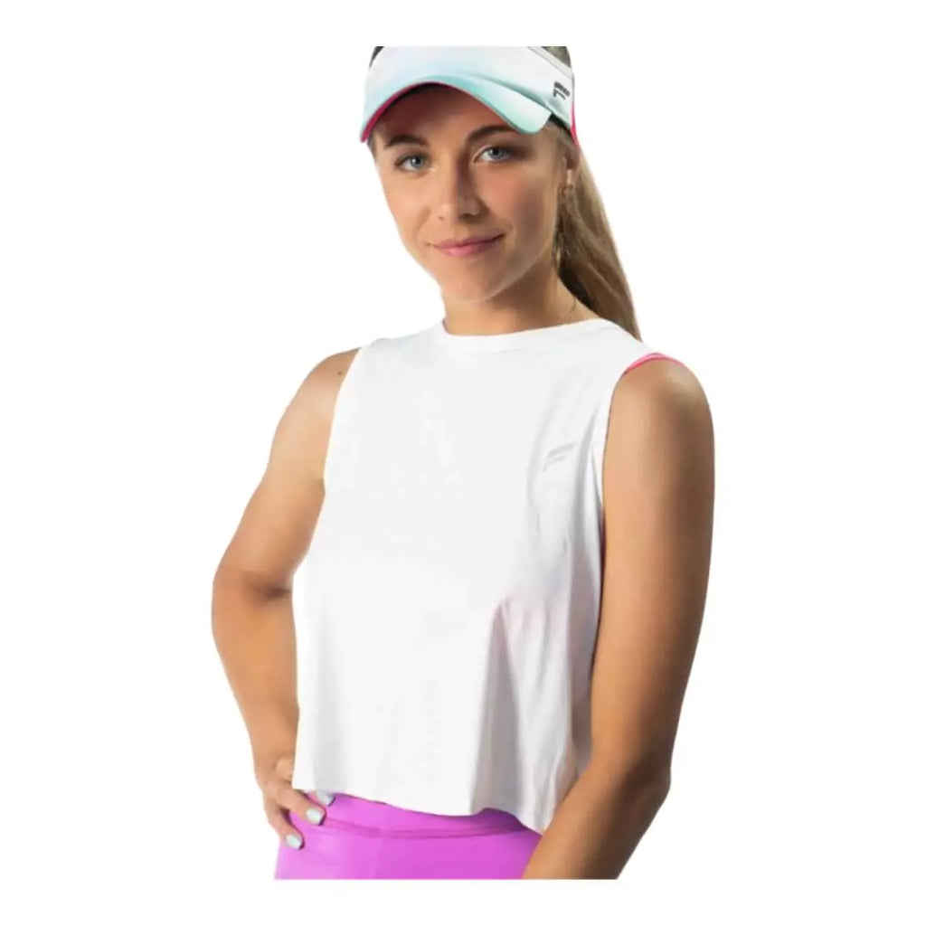 SPORT:BEACH TENNIS. Shop Flow Beach tennis at iamBeachTennis Depot Store. Female model,  wearing a white Flow Beach Tennis LAGUNA MALLORCA Tank Top.