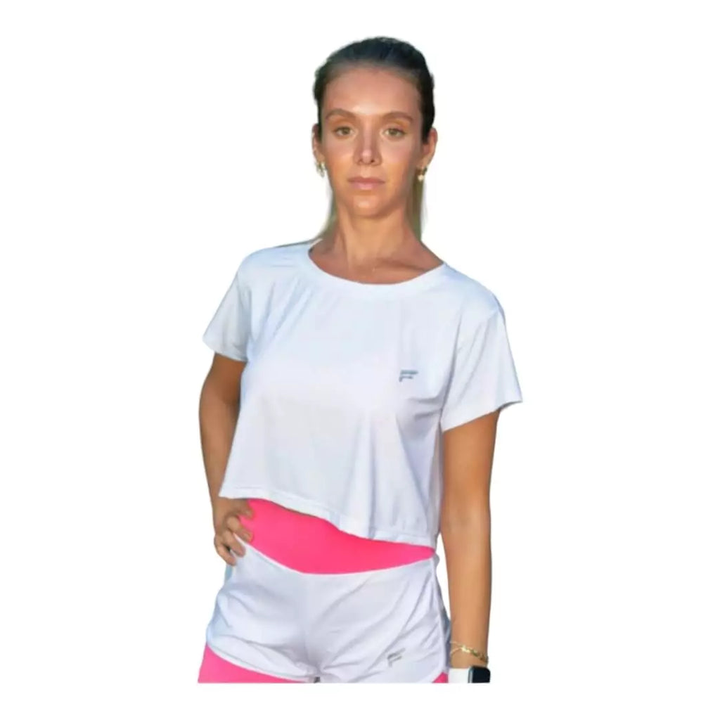 SPORT:BEACH TENNIS. Shop Flow Beach tennis at iamBeachTennis Depot Store. Female model, wearing a white Flow VENICE Cropped T-Shirt.