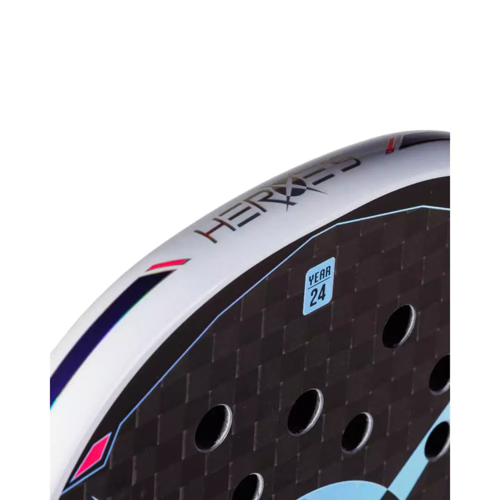 SPORT: BEACH TENNIS. Purchase Heroes at iamRacketSports.com. A Heroe's 2024 BT #ISON Beach Tennis Racket, partial view of face and top edge.
