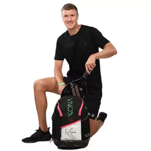 A person using a Kona PLUS K-VALO Backpack, available from iamBeachTennis.com, online and from Miami instore, worldwide shipping.
