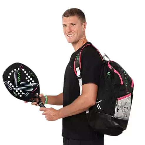 A person using a Kona PLUS K-VALO Backpack, available from iamBeachTennis.com, online and from Miami instore, worldwide shipping.
