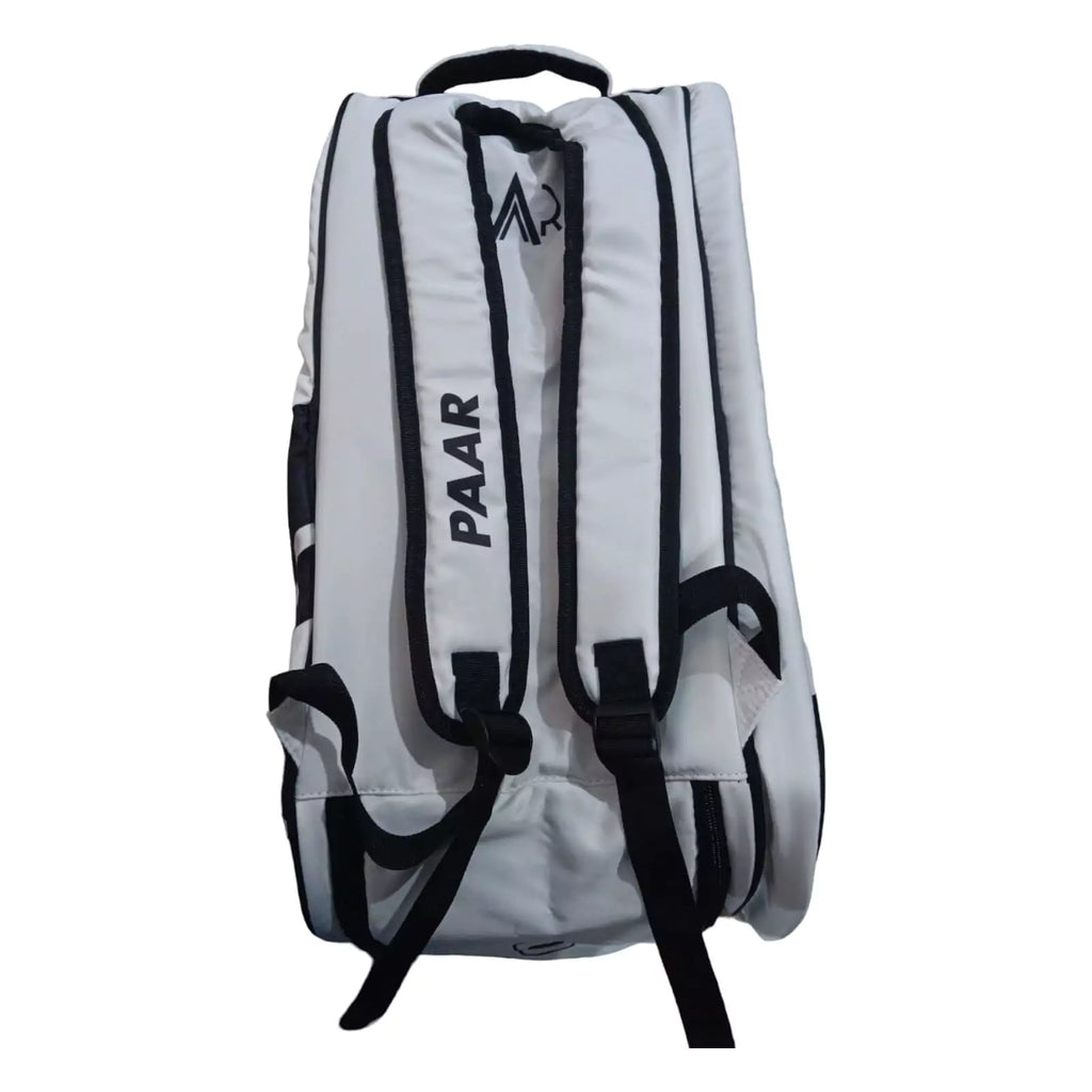 A white Paar 2024 White Beach Tennis Racket Bag, purchase at iamBeachTennis.com, Miami store.