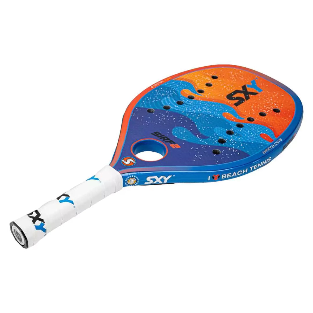 SPORT:BEACHTENNIS. Shop Sxy Brand at iamBeachTennis miami shop. SXY THE BLUE SIRF 2 2024 Beach Tennis Racket/Paddle, beginner to advanced level player, lying flat.