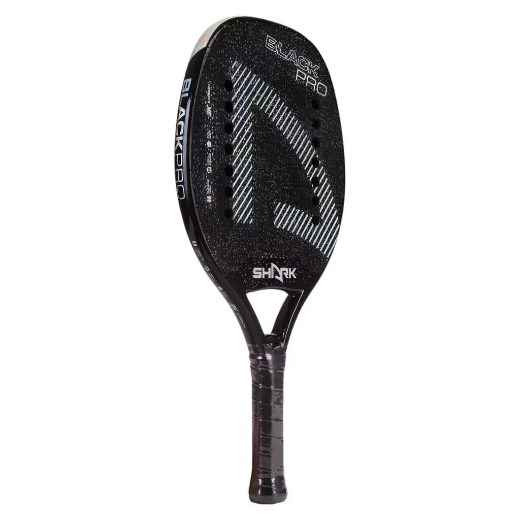 A Shark BLACK 2024 advanced Beach Tennis Racket. Carbon 3K , Eva Soft core ,22 mm, Micro-granules treated, shop at iamBeachTennis.com online store. 