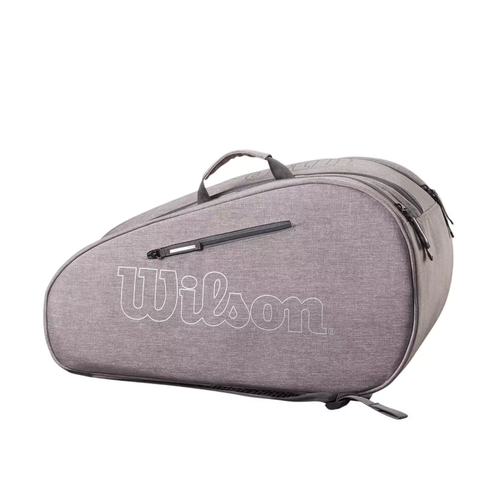 Side profile of a grey heather Wilson Team Padel Bag, available from "iamRacketSports.com", online and in store, world wide shipping.