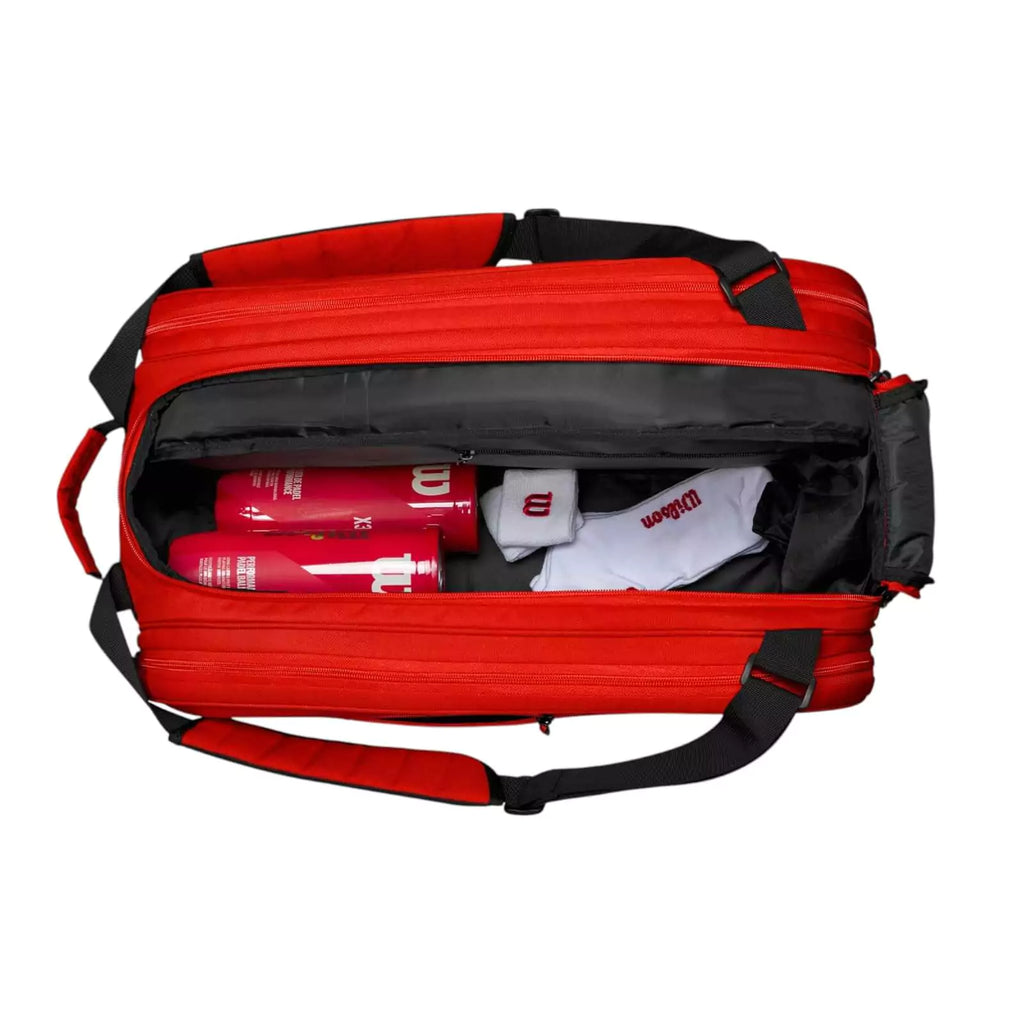 Open main compartment of a Wilson Tour Red Padel Bag, available from iamRacketSports.com, online and in store, world wide shipping