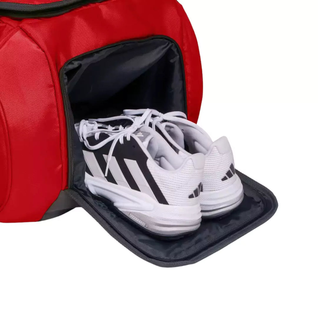 Shoe compartment of the  Adidas RACQUET BAG TOUR 3.3, available at iamracketsports.com.