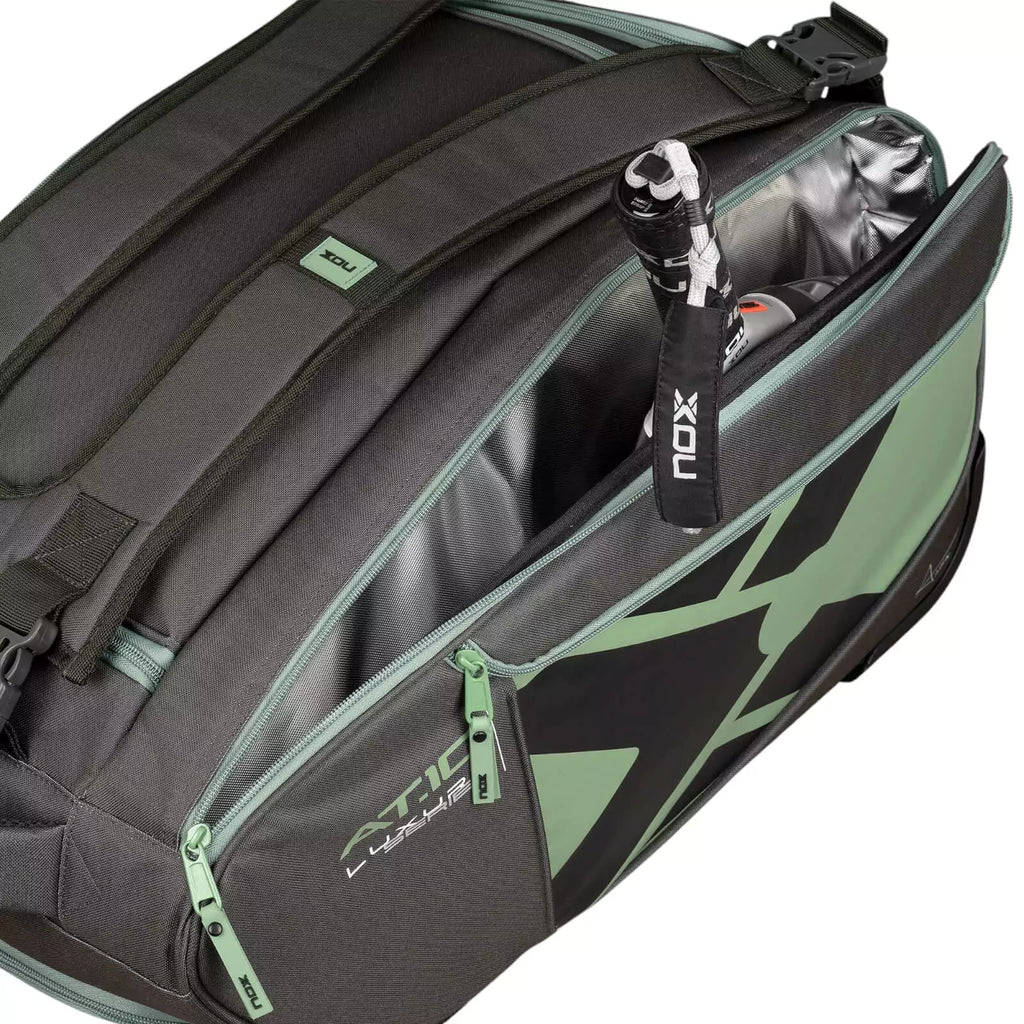 A Nox AT10 COMPETITION TROLLEY Padel bag, with open side racket compartment, purchase from "iamracketsports.com", Miami shop.
