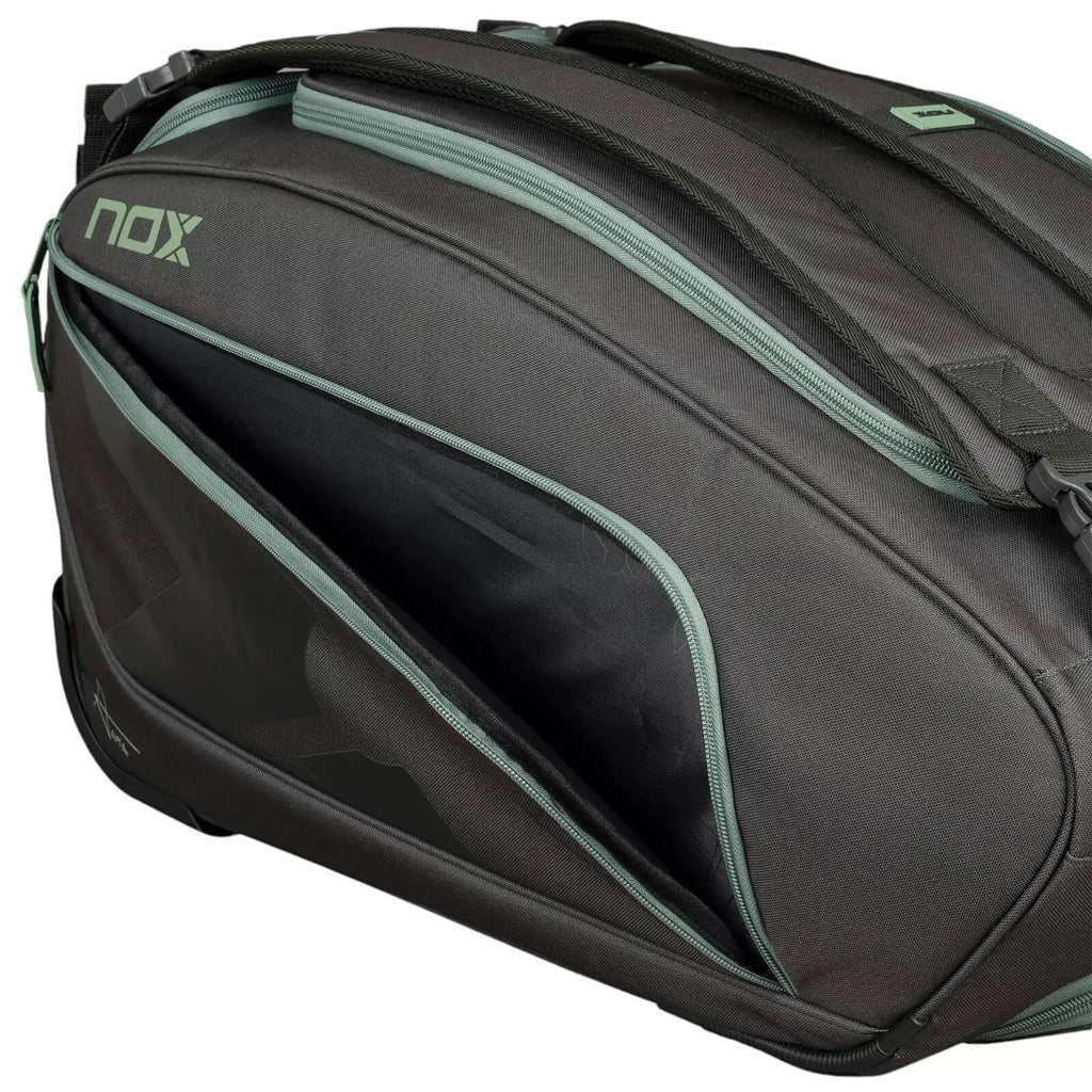 A Nox AT10 COMPETITION TROLLEY Padel bag, with open side compartment, purchase from "iamracketsports.com", Miami shop.
