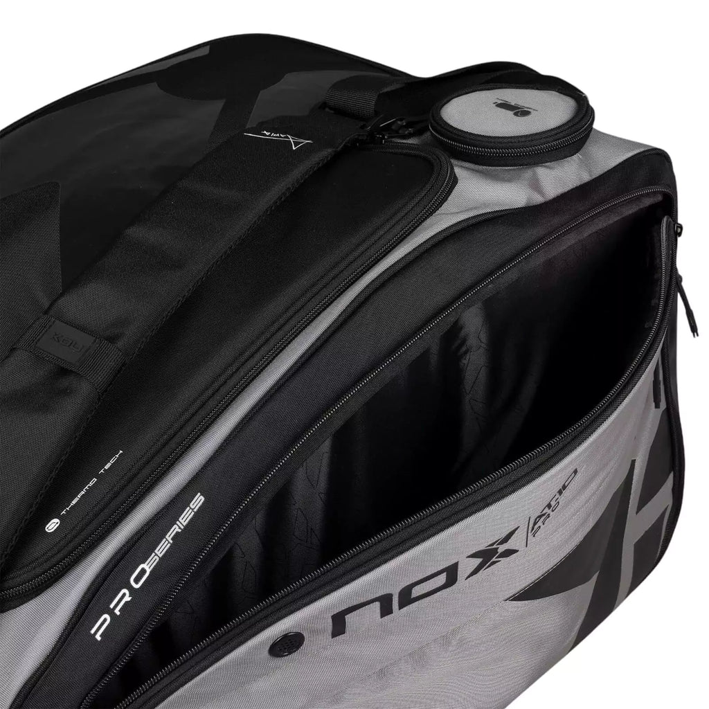 A Nox AT10 COMPETITION XL COMPACT 2024 Racket bag, open side compartment, available from "iamracketsports.com", Miami shop.
