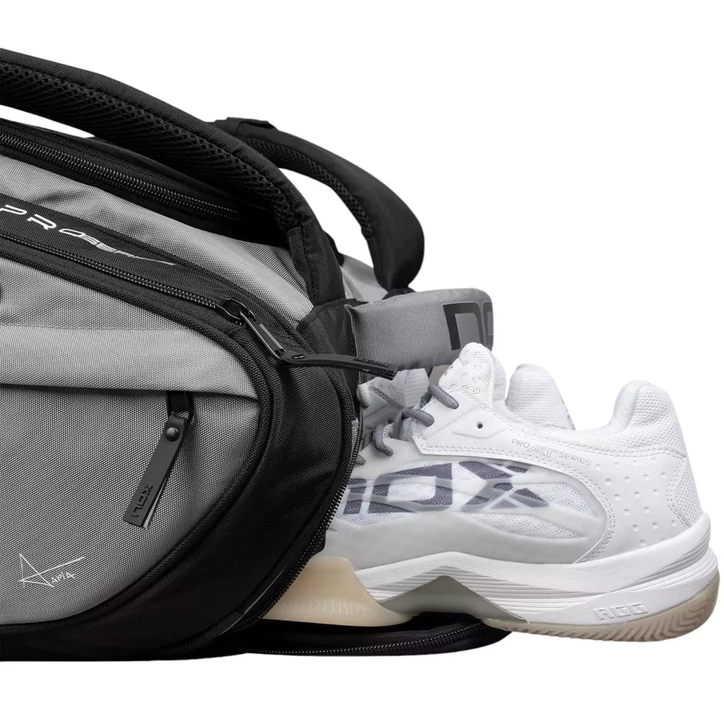 Shoe compartment of a Nox AT10 COMPETITION XL COMPACT 2024 Racket bag, available from "iamracketsports.com", Miami shop.
