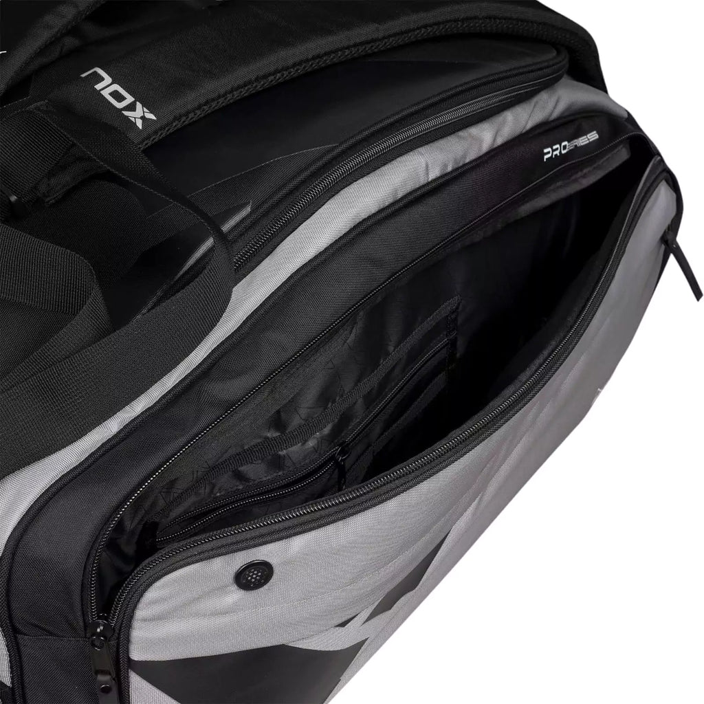 A Nox AT10 COMPETITION XL COMPACT 2024 Racket bag, with open side compartment, available from "iamracketsports.com", Miami shop.
