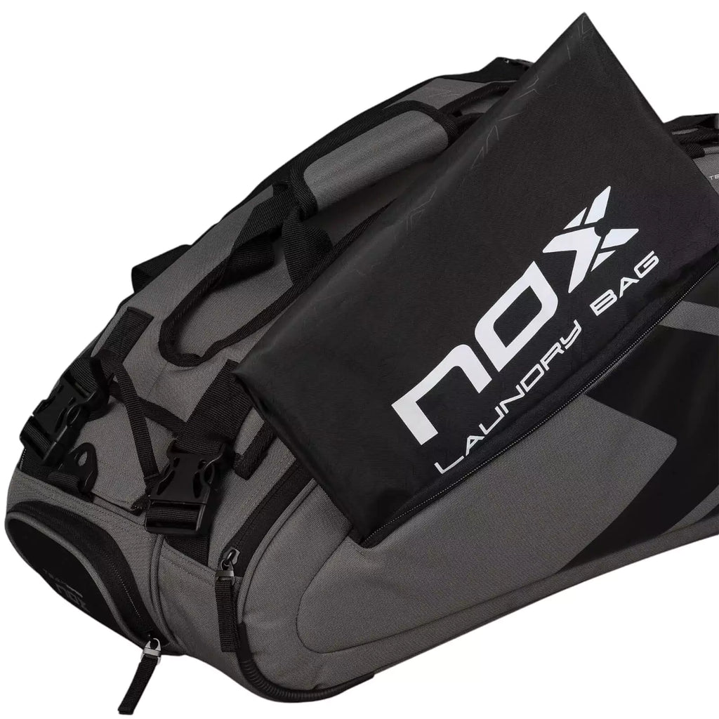 A gray and black, Nox AT10 TEAM Padel Racket Bag with open side compartment, available from "iamracketsports.com", Miami shop.