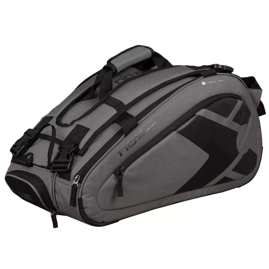 A gray and black, Nox AT10 TEAM Padel Racket Bag, available from "iamracketsports.com", Miami shop.