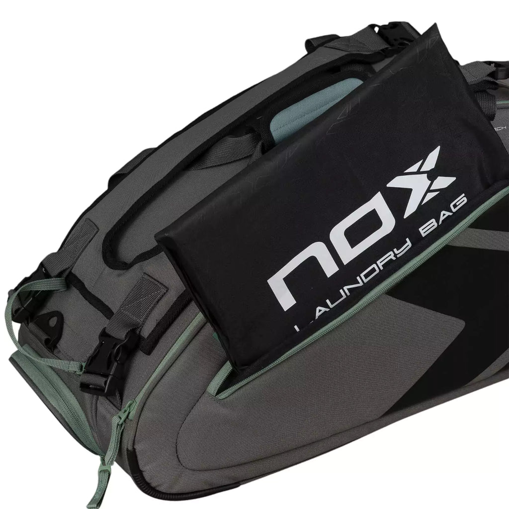 A gray and green, Nox AT10 TEAM Padel Racket Bag with open side compartment, available from "iamracketsports.com", Miami shop.