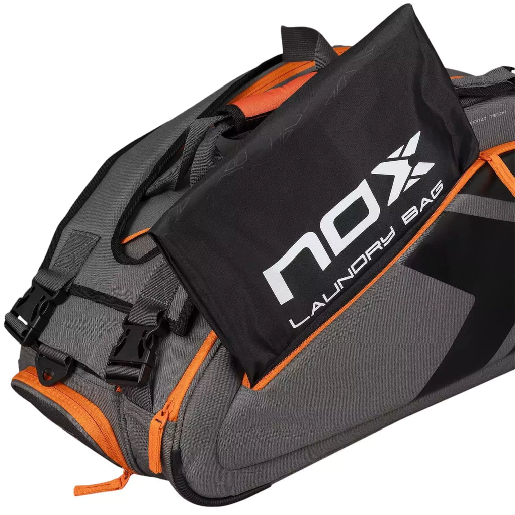 A Nox AT10 TEAM Padel Racket Bag with open laundry compartment, available from "iamracketsports.com", Miami shop.