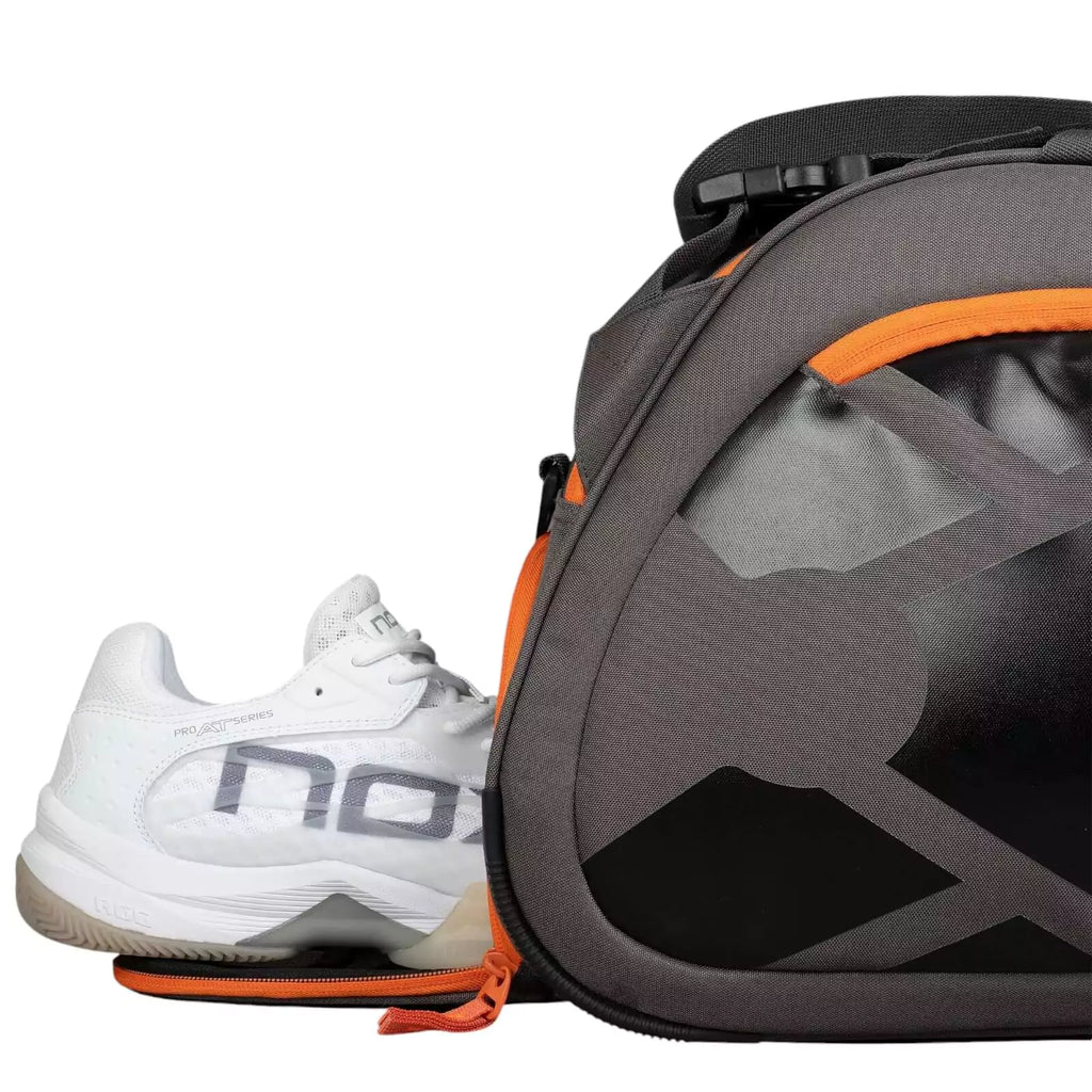 Shoe compartment of a Nox AT10 TEAM Padel Racket Bag, available from "iamracketsports.com", Miami shop.