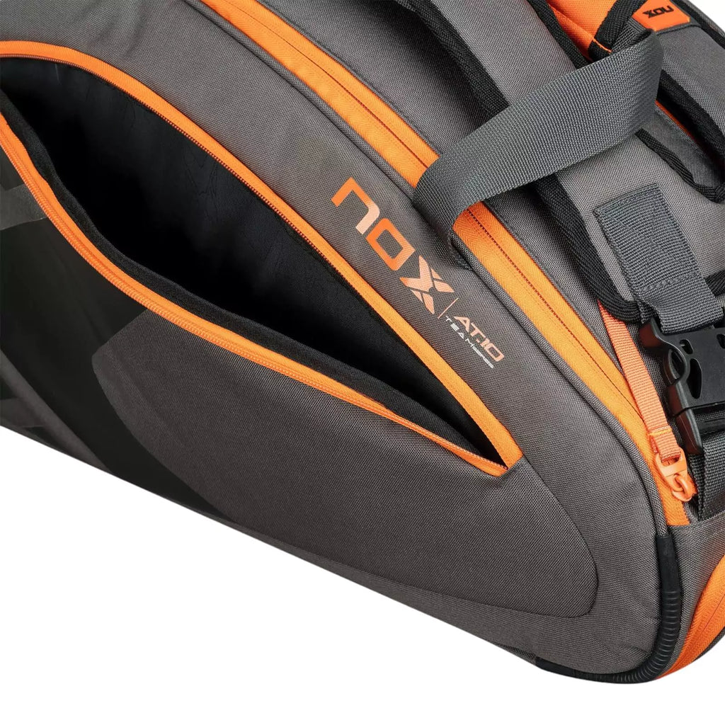 A  Nox AT10 TEAM Padel Racket Bag with open side compartment, available from "iamracketsports.com", Miami shop.