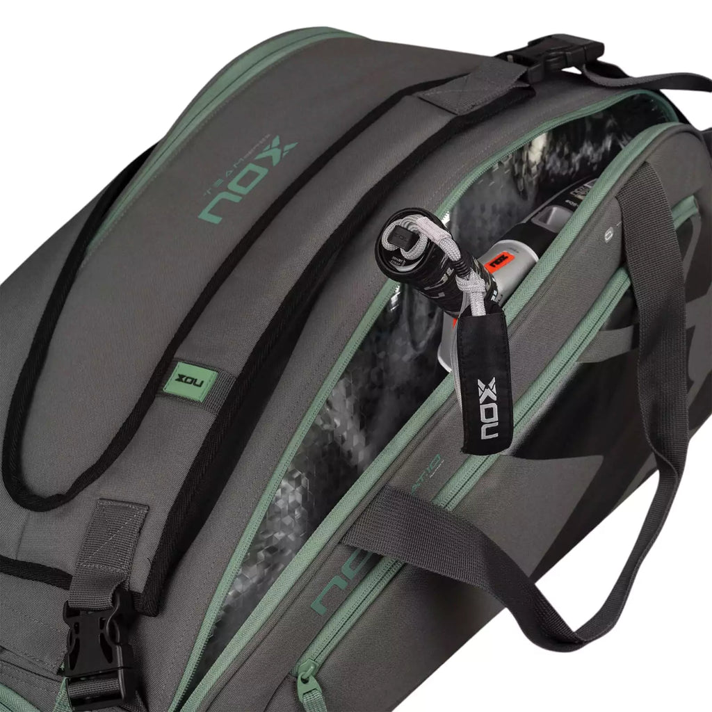 A gray and green, Nox AT10 TEAM Padel Racket Bag with open side racket compartment, available from "iamracketsports.com", Miami shop.