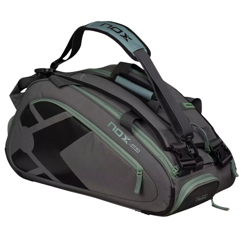 A gray and green, Nox AT10 TEAM Padel Racket Bag, available from "iamracketsports.com", Miami shop.