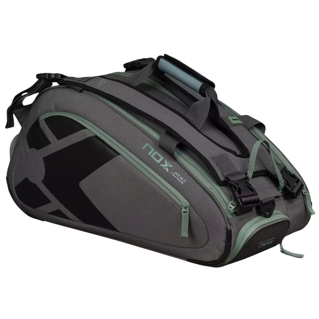 A gray and green, Nox AT10 TEAM Padel Racket Bag, available from "iamracketsports.com", Miami shop.