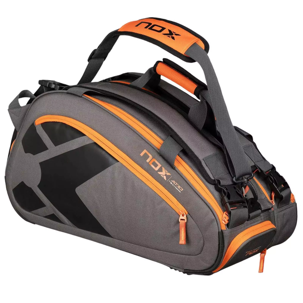 A Nox AT10 TEAM Padel Racket Bag, shoulder carrying strap extended, available from "iamracketsports.com", Miami shop.