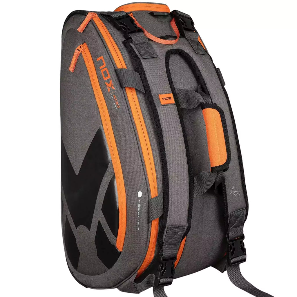 A standing Nox AT10 TEAM Padel Racket Bag, available from "iamracketsports.com", Miami shop.
