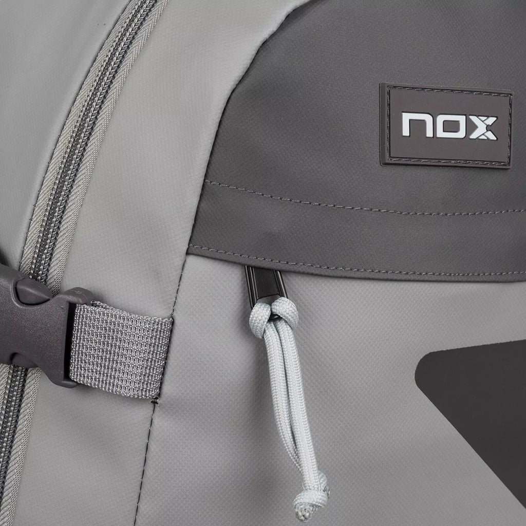 Front compartment zipper of a Nox AT10 TEAM SERIES Backpack, available from "iamracketsports.com", Miami shop.