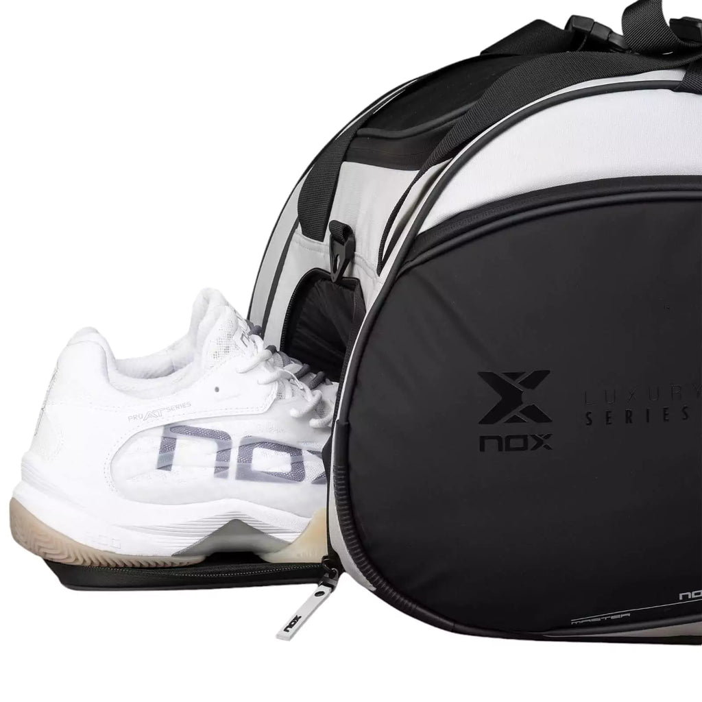 Shoe compartment of a Nox LUXURY MASTER Padel Racket Bag,
purchase from "iamracketsports.com", Miami shop.