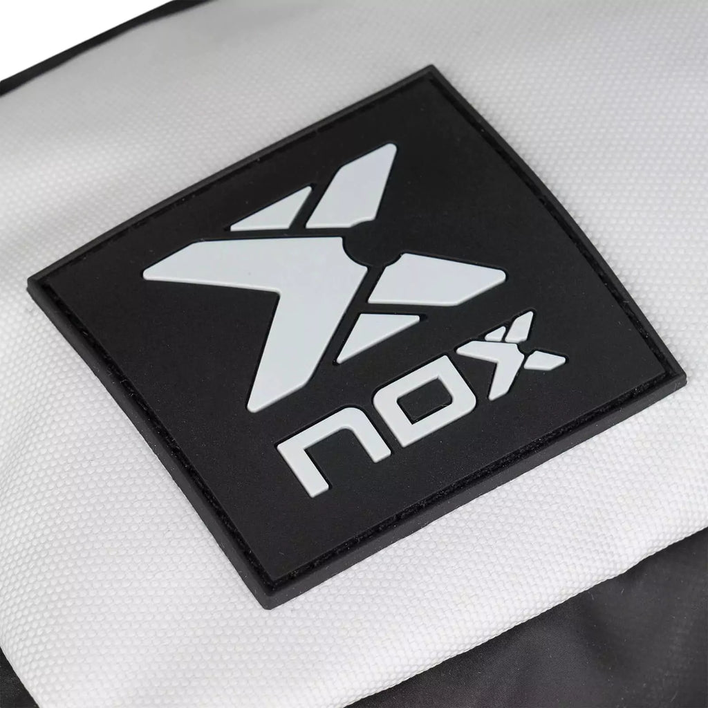 A Logo of a Nox LUXURY TOILETRY BAG, purchase from "iamracketsports.com", Miami shop.
