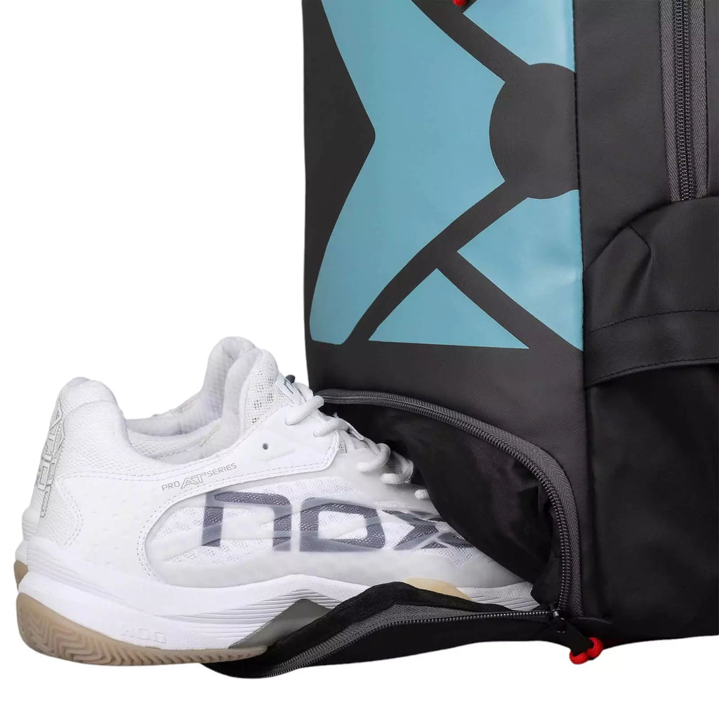 Shoe compartment of a Nox ML10 TEAM SERIES Backpack, available from "iamracketsports.com", Miami shop.
