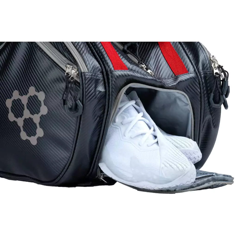 SPORT:PICKLEBALL.  Shop at iamPickleball.store for Pickleball items. Shoe compartment of the  CRBN Pro Team Tour pickleball Bag 2.0.