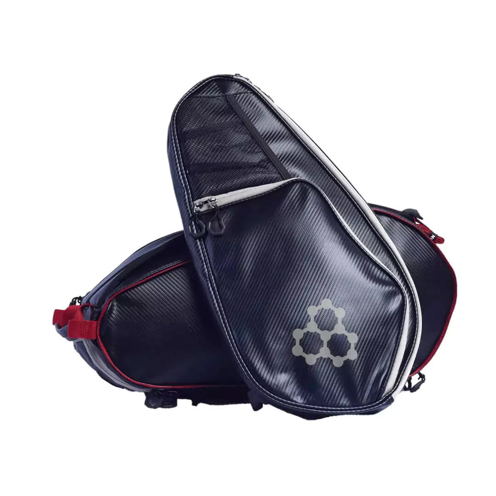 SPORT:PICKLEBALL.  Shop at iamRacketSports.com for CRBN bags. Side sling bag of the black  CRBN Pro Team Tour pickleball Bag 2.0.