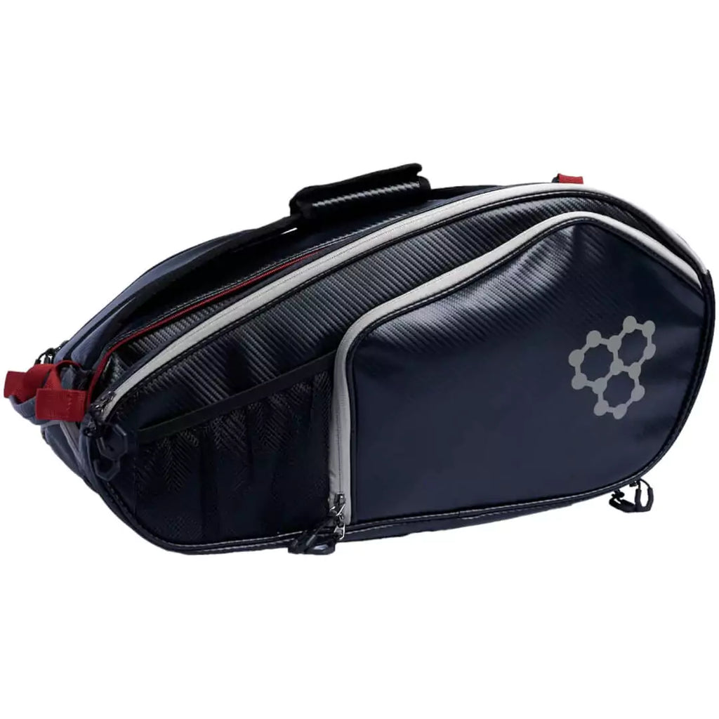 SPORT:PICKLEBALL.  Shop at iamRacketSports.com for CRBN bags. Side sling bag of the black  CRBN Pro Team Tour pickleball Bag 2.0.