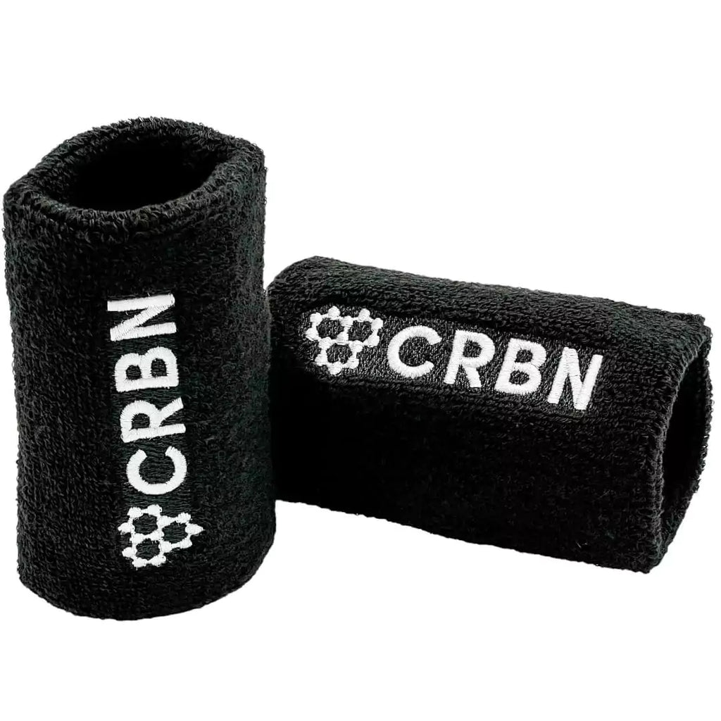 Pair of black 4" terry loop wristbands CRBN Wristbands. Shop CRBN at iamRacketSports.com.