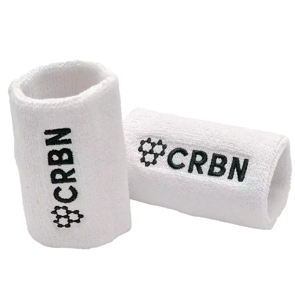 Pair of white 4" terry loop wristbands CRBN Wristbands. Shop CRBN at iamRacketSports.com.