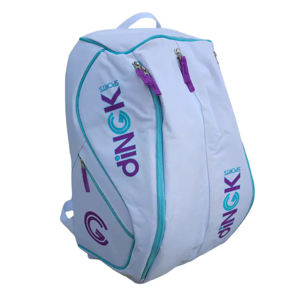 SPORT: PICKLEBALL. Shop DiNGK Sports Pickleball at iamRacketSports, Miami, Florida, USA. Bag model is a 2023 DiNGK Pickleball PRO TOUR RACQUEST BAG in white. Backpack/bag is in vertical orientation facing right.
