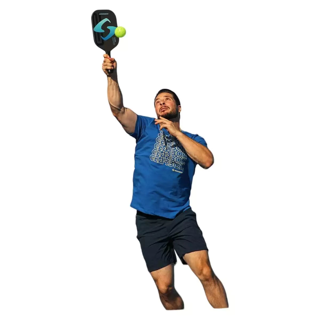 A player using a GearBox G2 Elongated Pickleball Paddle, available from iamracketsports.com, Miami store.