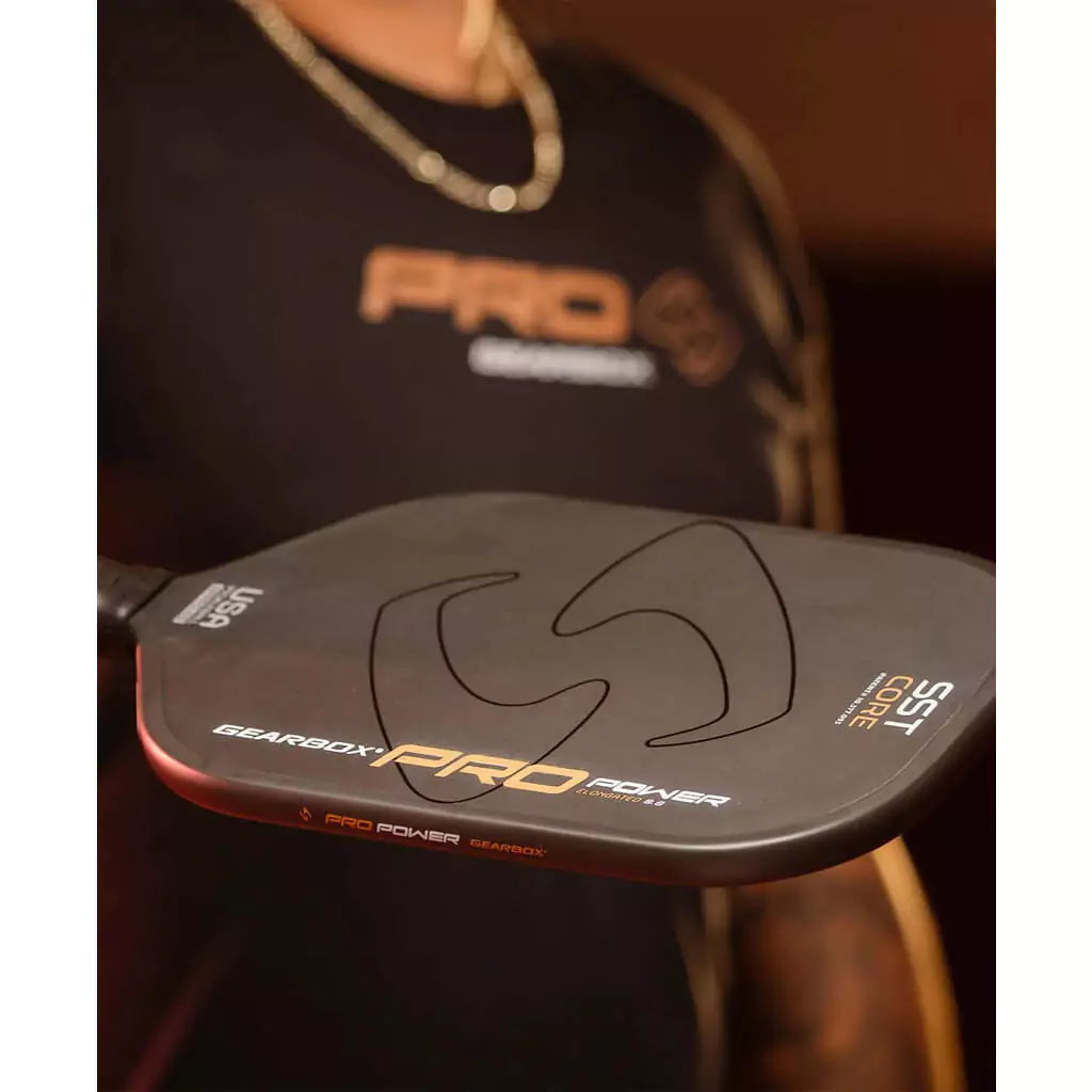 SPORT: PICKLEBALL. Shop paddles/rackets at iamRacketSports Colisium Store. Male player holding a GearBox Sports PRO POWER ELONGATED Pickleball Paddle.